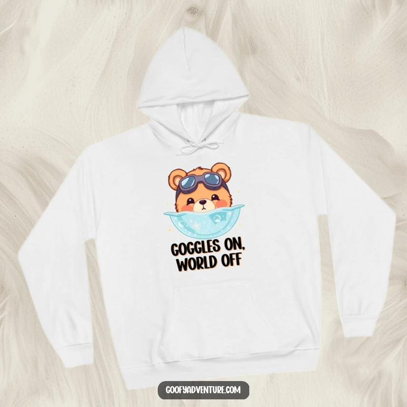 Funny bear hoodie showing a cute bear wearing goggles, diving into a sparkling pool of stardust. Cozy and humorous.