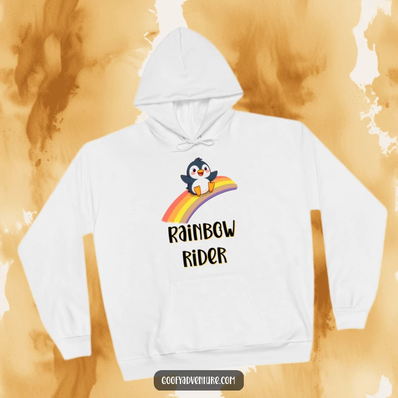 Funny Penguin hoodie, joyfully sliding down a giant rainbow, cozy and cheerful apparel.