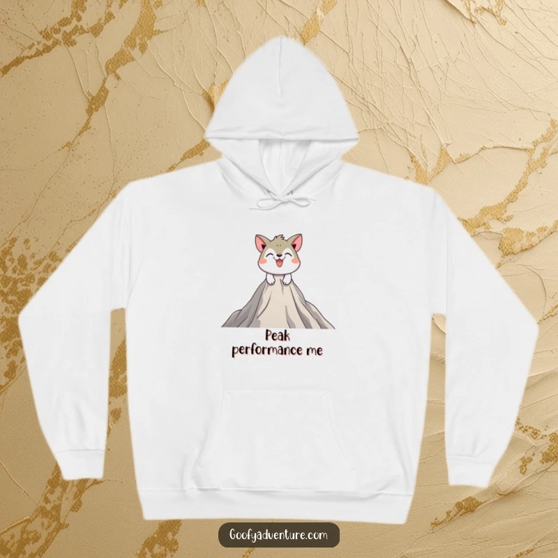 Funny hoodie depicting a playful animal character scaling a giant peak with a determined, happy grin, offering warmth and motivation.
