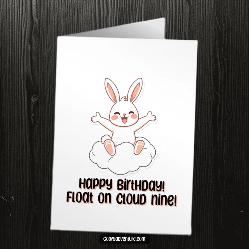 Funny Free Printable Birthday Card: Cheerful rabbit riding a fluffy cloud with arms outstretched in joy. Whimsical.