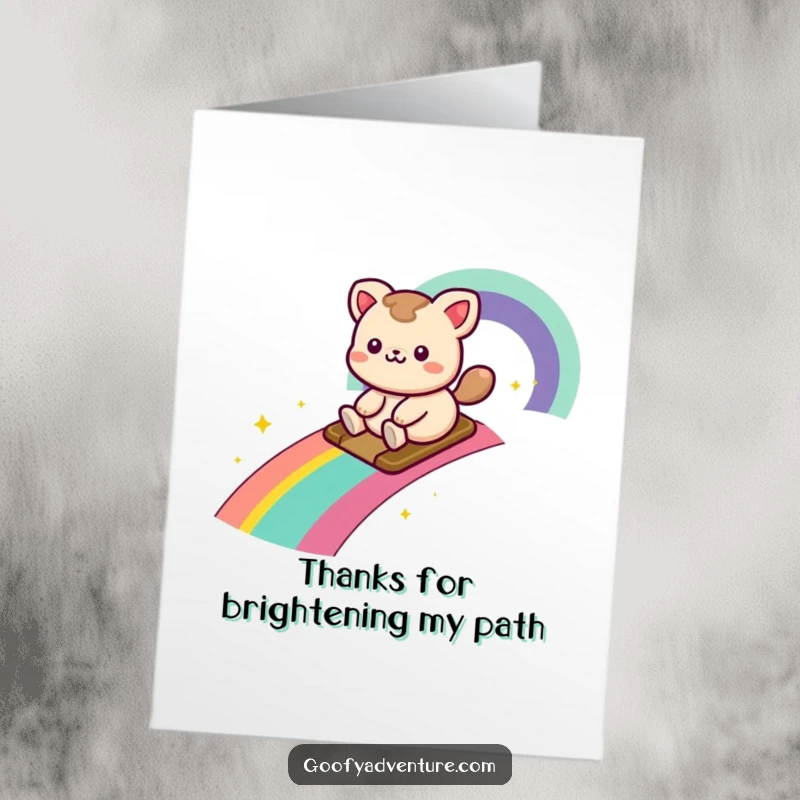 Funny Free Printable Thank You Card of a kawaii animal character joyfully sliding down a rainbow trail, a colorful expression of thanks.