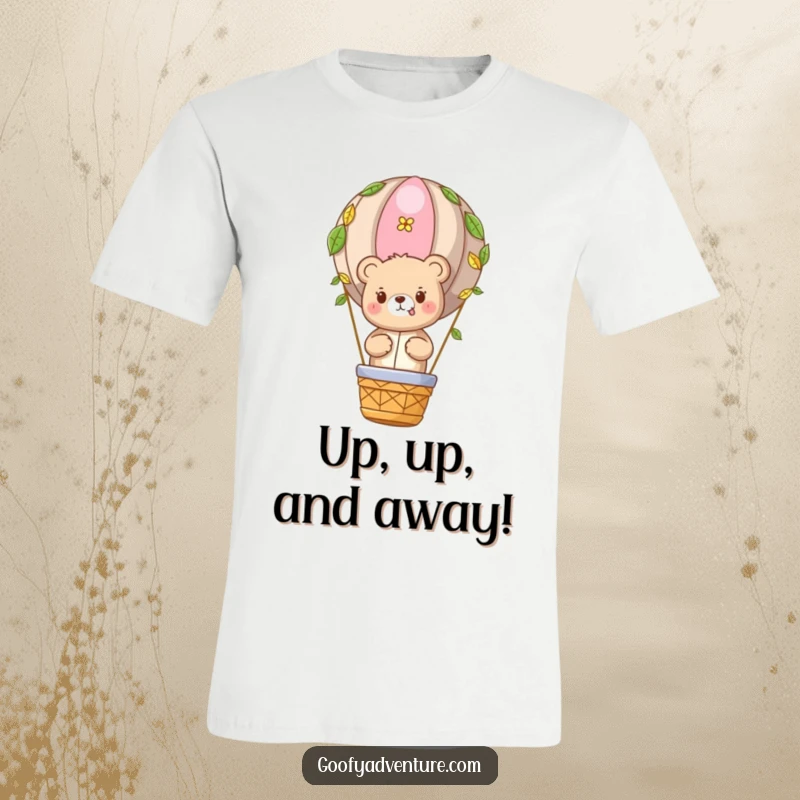 Funny Bear Travel T-Shirt: Cute bear character soaring in a hot air balloon decorated with leaves, a humorous design for adventurers.
