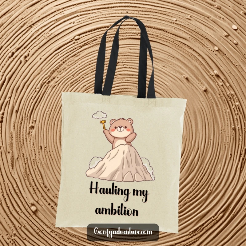 Funny tote bag featuring a determined bear character climbing a fluffy cloud mountain, symbolizing strength and the pursuit of goals.