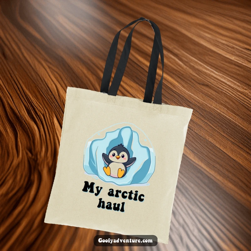 Funny playful penguin sliding down an icy glacier, sturdy tote bag, winter theme, excellent funny gift.